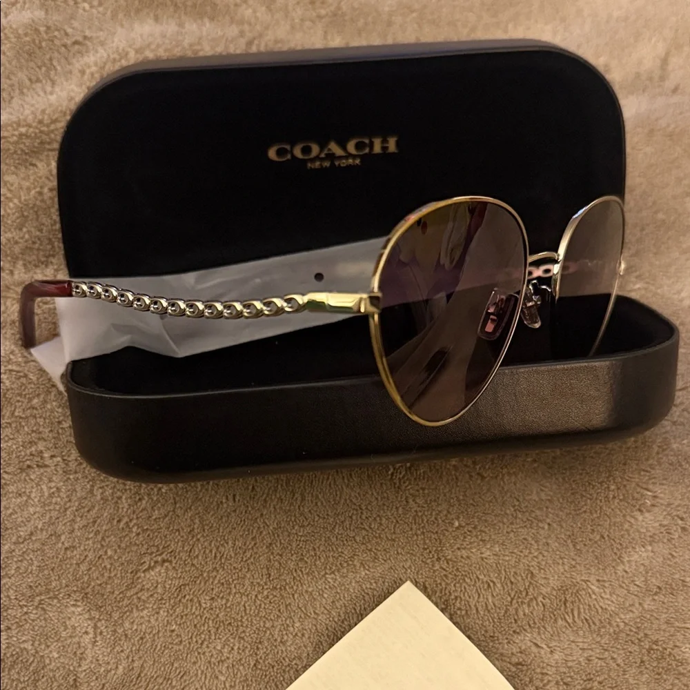 Coach Women's Sunglasses with Gold Frame and Black Lenses - Picture 2 of 3